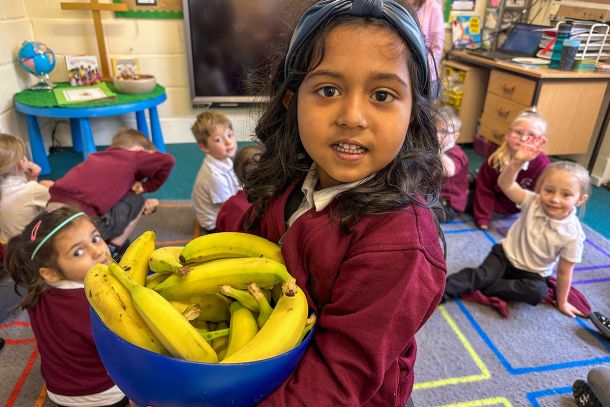 St Mary's Primary School, pupil with bananas